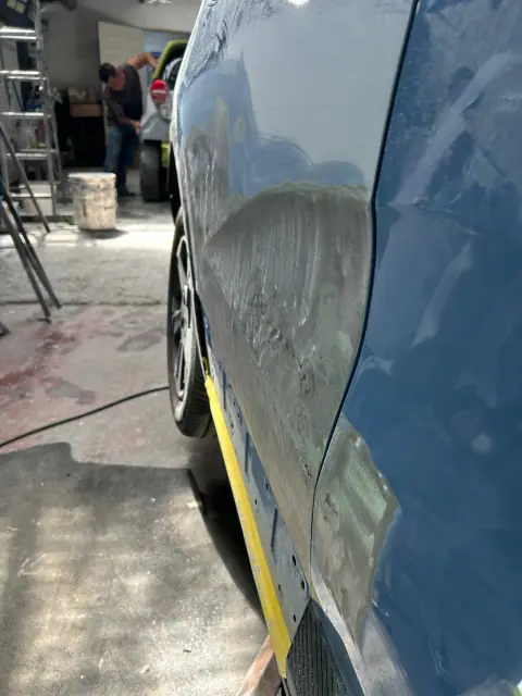 Puerta pintada Geely Geometry E 2024